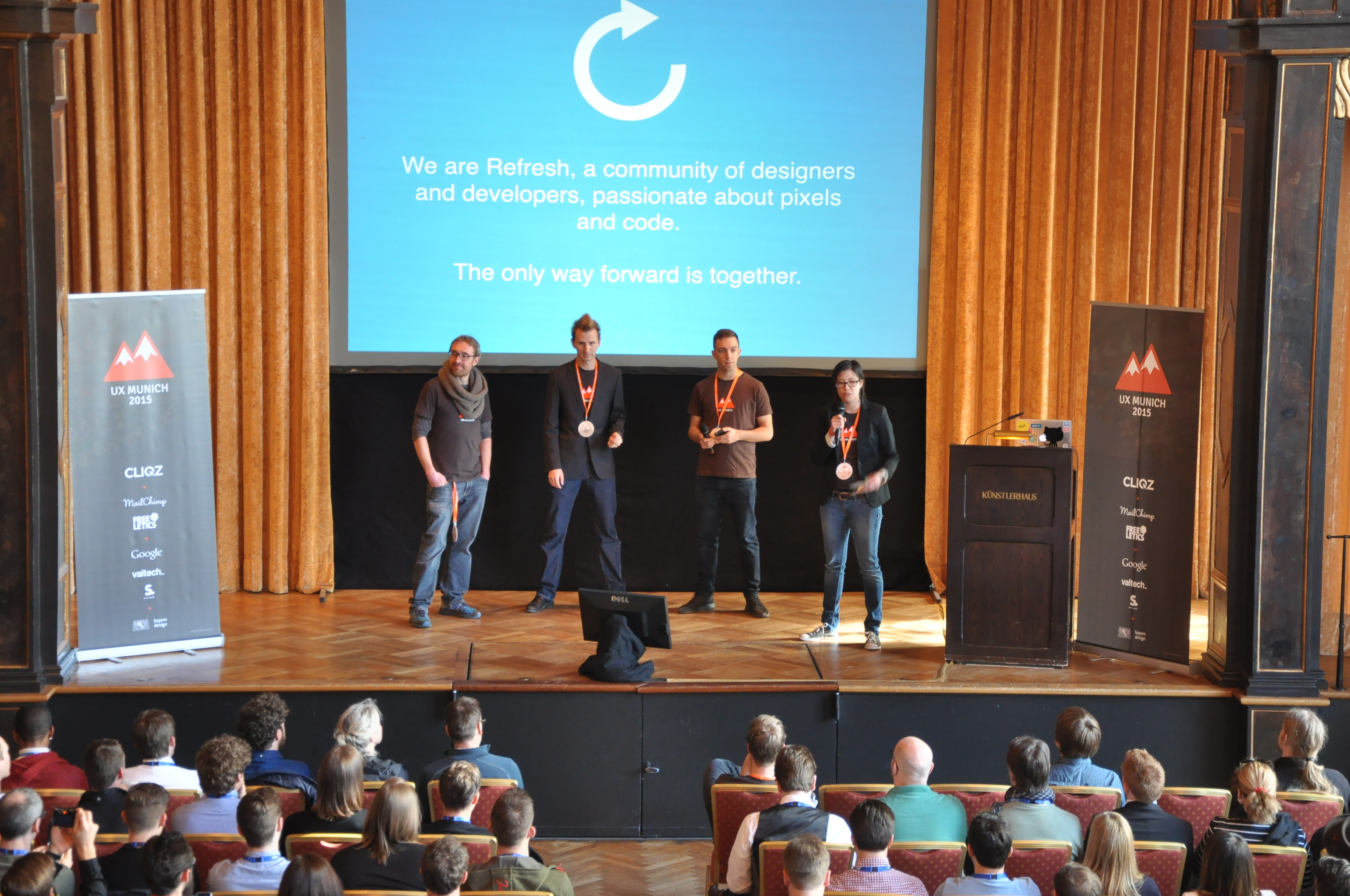 On stage at UX Munich 2015 with my co-founders and co-organizers