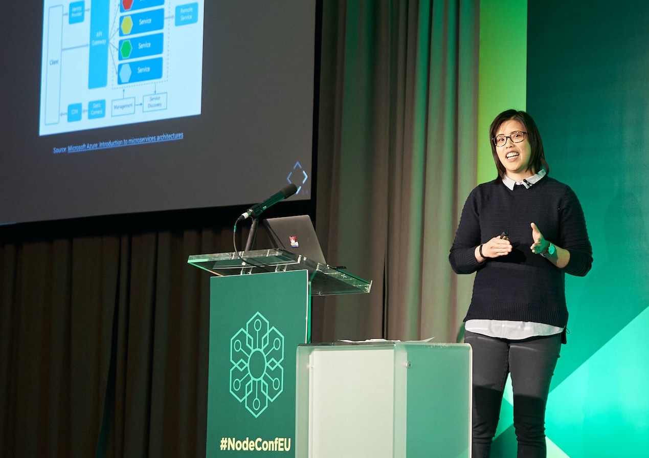 Julie speaking on stage at NodeConf